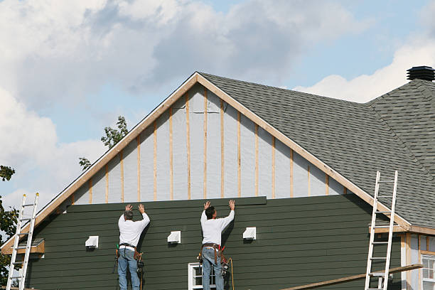 Professional Siding Repair technician working in Wakeman, OH